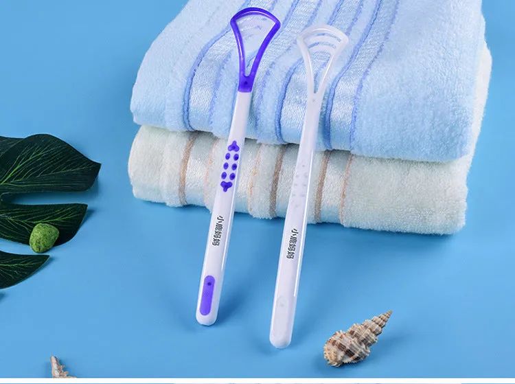 Plastic tongue scraper